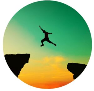 A person jumping over a chasms